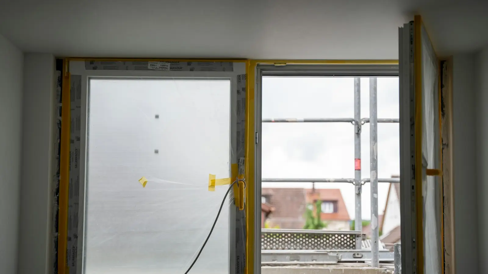 Window installation in progress on a residential home