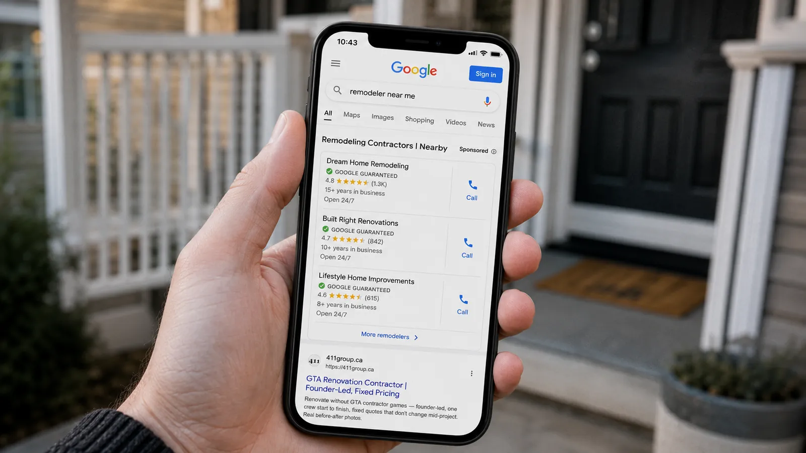 Phone showing a remodeler near me Google search with remodeling contractors in the local pack