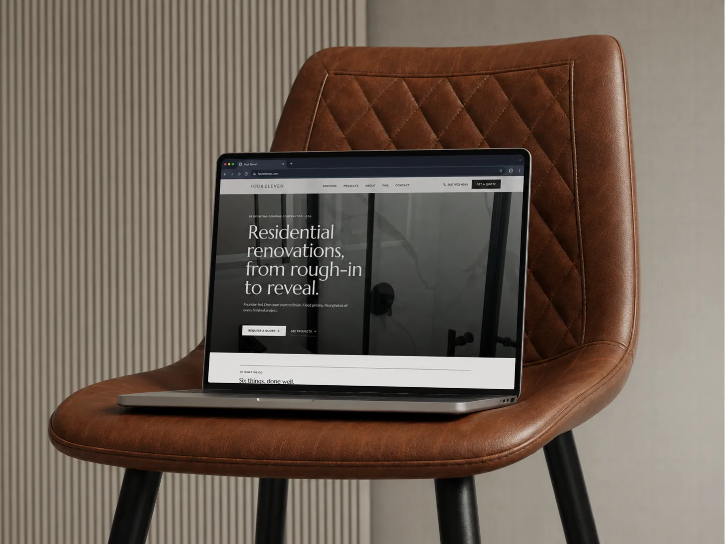 Four Eleven Contracting remodeling website shown on a MacBook, built by Fervor Studio
