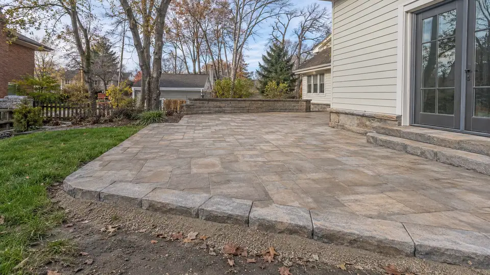 Freeze-thaw-rated paver patio in a Chicago North Shore backyard