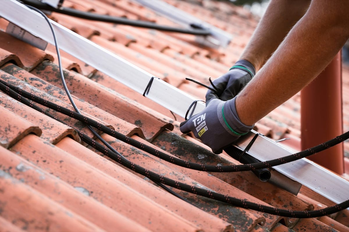 Aerial view of an asphalt-shingle roof on a residential property
